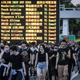 Protesters walk on a highway near Hong Kong’s airport following a protest against police brutality, Aug. 12, 2019.